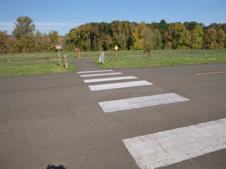 Crosswalk where the trail from the visitor center goes across to the paved trail