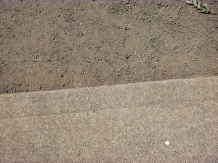 Transition from natural surface to paved surface