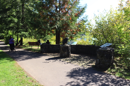 Wide paved trail &ndash; the Willamette Meteorite &ndash; view of Tualatin River from bench