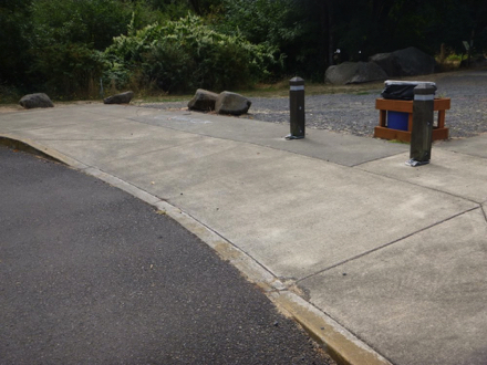 Smooth paved transition from parking lot to picnic tables and playgrounds