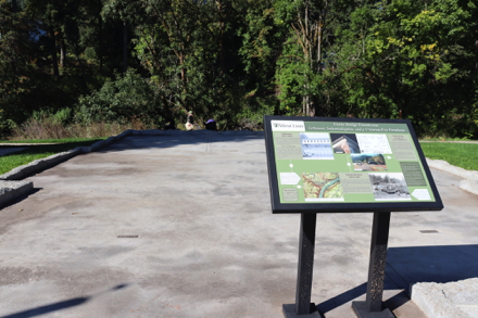 Interpretive display about the Fields Bridge Farmhouse &ndash; outline of house and rooms