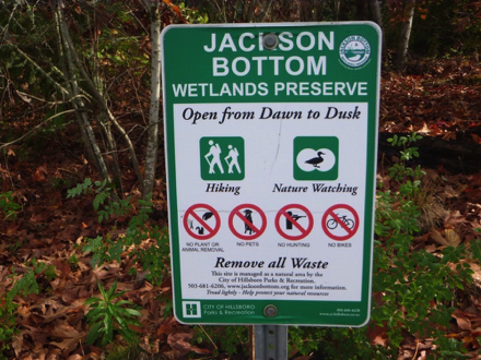 Sign &ndash; &rdquo;Jackson Bottom Wetlands Preserve, open dawn to dusk, hiking, nature walking&rdquo; &ndash; no pets or bikes &ndash; remove waste