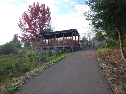 Paved surface &ndash; wetlands preserve to north view parking lot &ndash; end of trail &ndash; shelter &ndash; gate closed when flooded