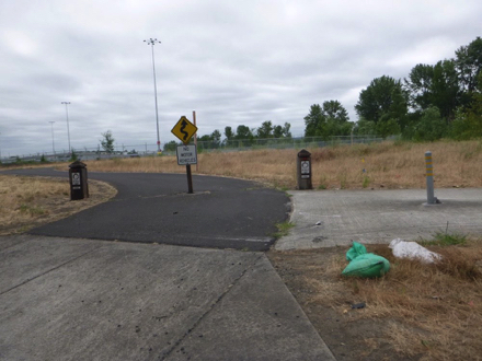 The 40 Mile Loop ends at the entrance to Kelley Point Park - hard surface - no motor vehicles