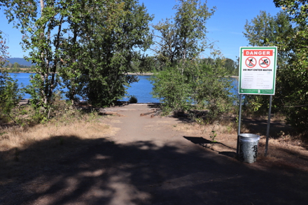 Path to the beach on the Willamette River side - transition from hard surface to soft surface - logs on beach