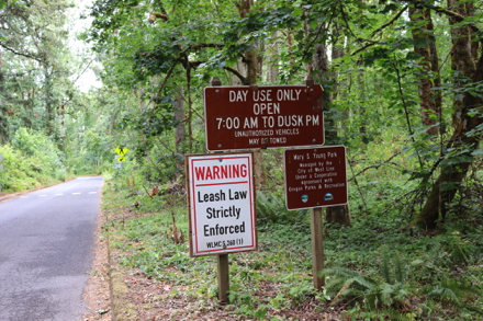 Hours of operation and WARNING: Leash Law Strictly Enforced