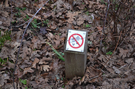 Sign on short post &ndash; walking restricted in this area