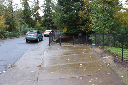 Curb cut and start of the trail