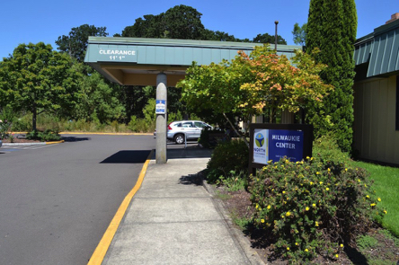 Parking lot with accessible spaces and bike rack at the Milwaukie Center &ndash; accessible restrooms