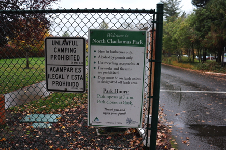 Park rules at one of the entrances &ndash; park hours: park opens at 7 am &ndash; park closes at dusk
