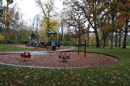 Two playgrounds with bark chip surface &ndash; one for toddlers and small children &ndash; both with ramps