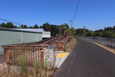 Before the underpass go left to the Springwater Corridor Trail and viewing platform