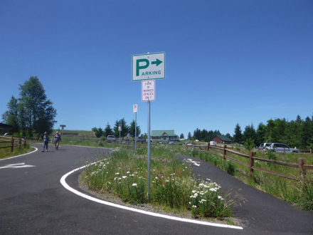 The parking lot is approximately &frac12; mile from the entrance