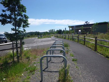 Bike racks and accessible parking spaces at the main parking lot