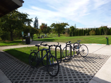 Trail entrance, bike rack, drinking fountain & garbage can