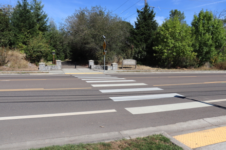 Crosswalk to continue on Rock Creek Trail across NE Walker Rd