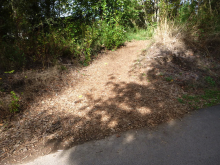Natural surface trail to disc golf &ndash; may have a steep cross-slope