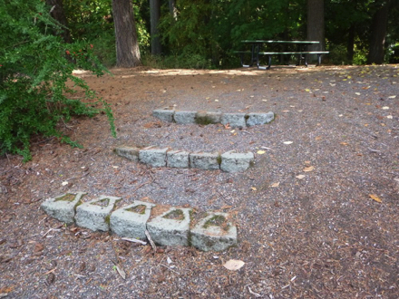 Picnic table by disc golf course &ndash; access by steps or steep natural surface