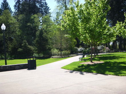 The paved perimeter trail begins north of the picnic shelter