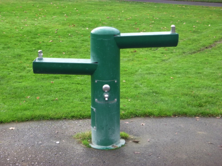 Two tier drinking fountain on hard surface
