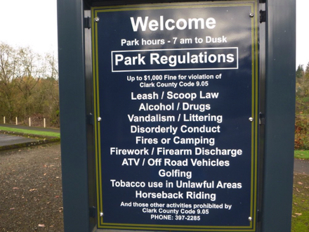 Sign &ndash; park hours 7 am to dusk &ndash; dogs on leash &ndash; no alcohol, drugs, firearms, fires, fireworks, littering, smoking