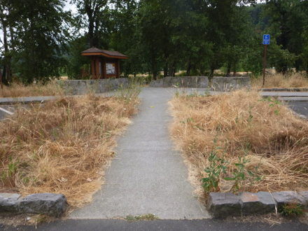 Paved access route to the trailhead and informational kiosk