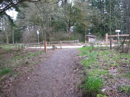 Boomer Trail at the main parking lot – natural onto paved surface – may have a lip Boomer Trail at the main parking lot – natural onto paved surface – may have a lip
