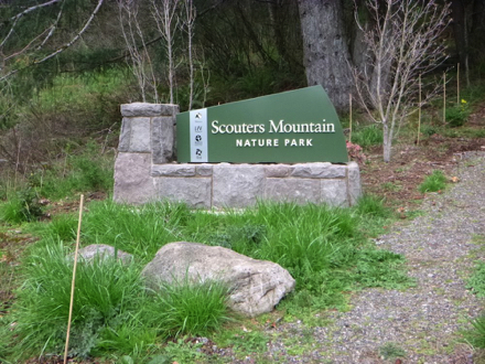 Entrance sign for Scouters Mountain Nature Park &ndash; park is open sunrise to sunset