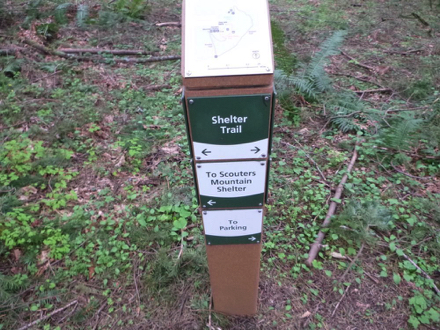 Example of trail signage capped with trail map indicating location Example of trail signage capped with trail map indicating location