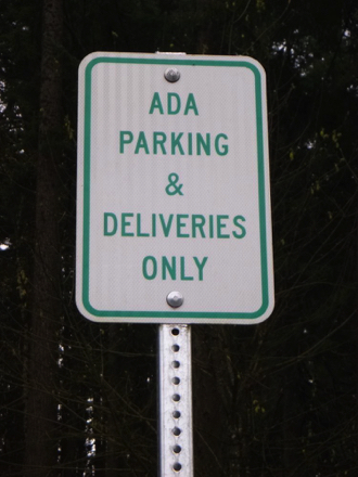 Sign for access road to shelter Sign for access road to shelter
