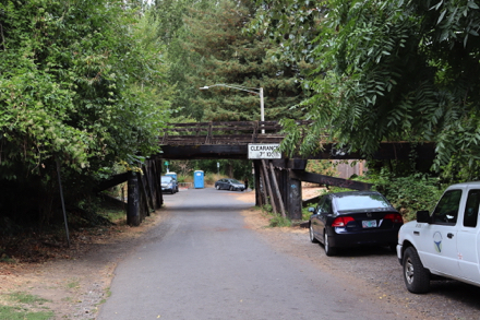 Train trestle approaching the park &ndash; street parking if spaces closer to the park entrance are full