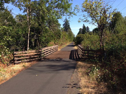 There are several wooden bridges traversing streams and/or smaller roads...