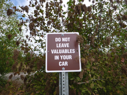 &lsquo;Do not leave valuables in your car&rsquo; sign posted in the main parking lot