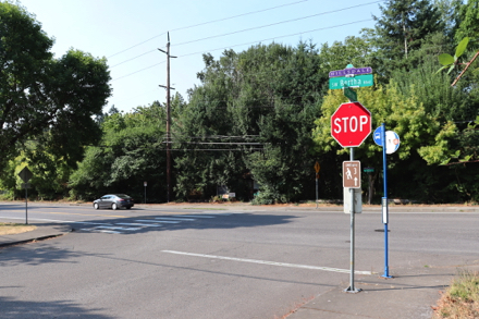 Crosswalk at entry to the trail.  Parking in residential area