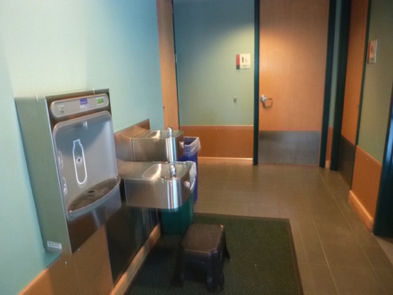 Restrooms in interpretive center - two-tier water fountain with stool - water bottle refill station