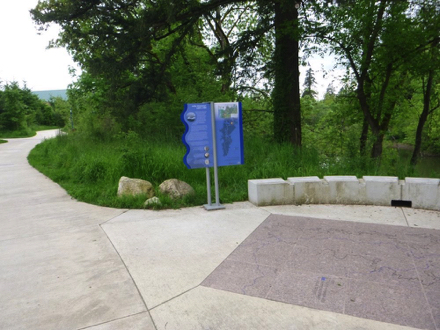 Hard surface trail - sign with history of the Ice Age - small raised wall at overlook -  map of Tualatin River