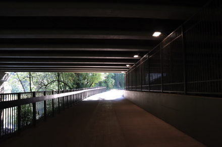 Hard surface trail going under Interstate 5 &ndash; low light and noisy