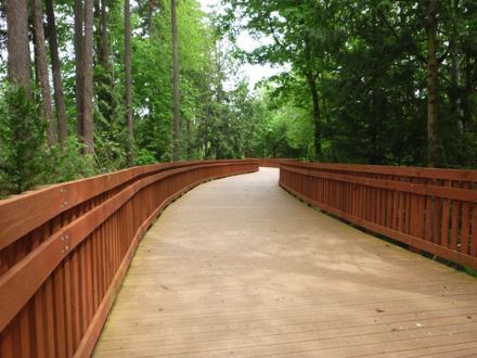 Boardwalk - wood railings on both sides - boardwalk dead ends