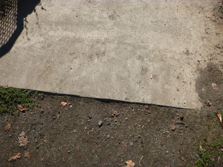 Transition from compacted gravel trail to concrete at the Wetland Observation Deck may have a lip
